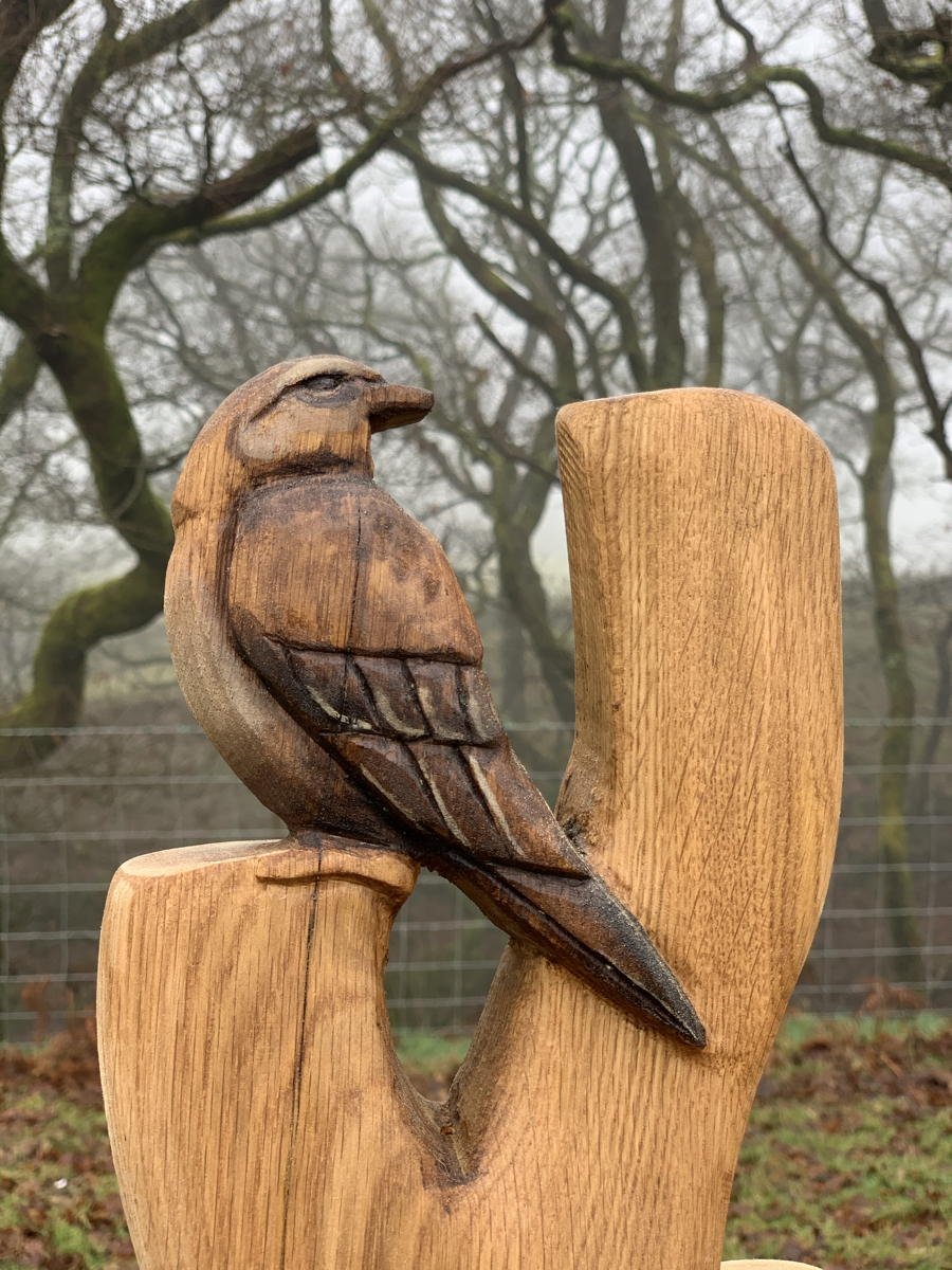 Handmade oak skylark memorial bench — carved bird tribute garden seating, Wales