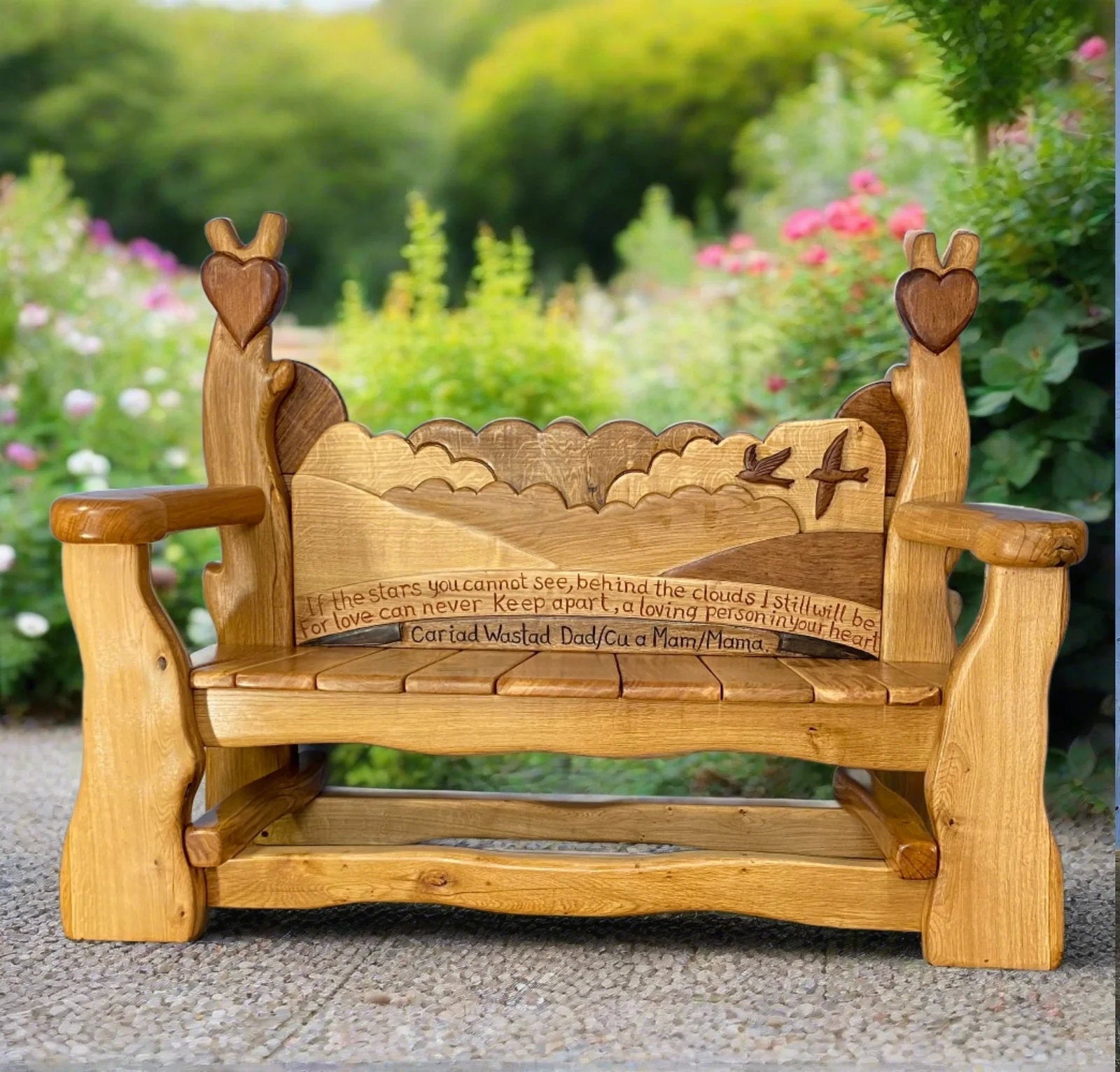 Handcrafted Skylark Memorial Bench made of solid oak, featuring engraved skylark birds and a personalized tribute message, perfect for a garden or outdoor space.

