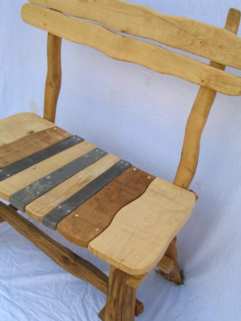 Slate and oak garden bench in outdoor setting — handmade natural stone and wood furniture, Wales