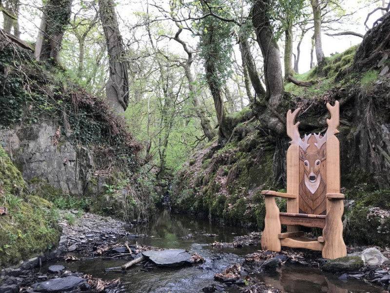 Stag Storytelling Chair by forest stream