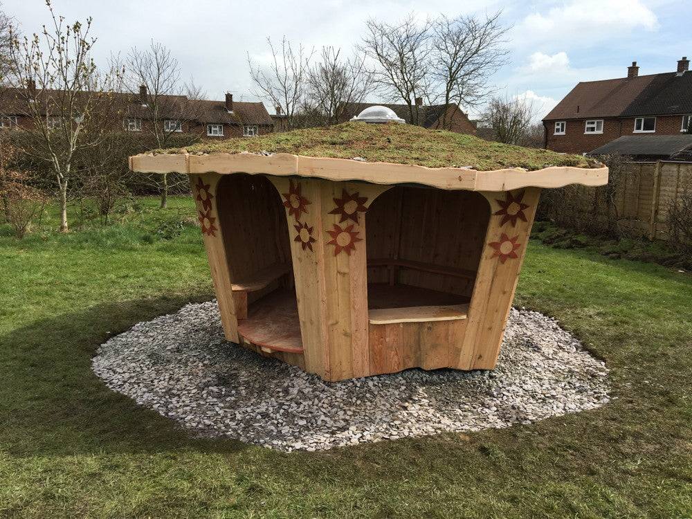 Handmade school playground shelter in wood — bespoke timber frame outdoor structure, Wales