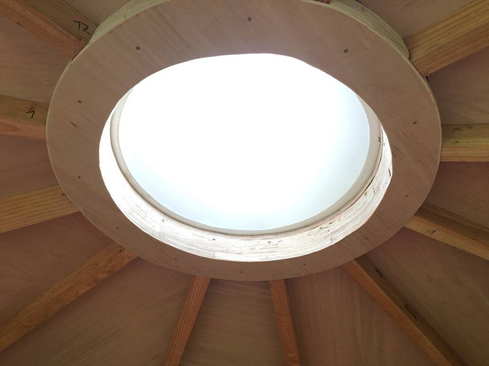 Dome light in handmade outdoor school shelter — bespoke timber frame structure, Wales