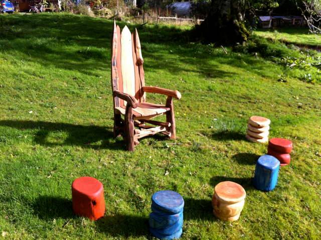 Handmade storytelling chair and carved oak stools — bespoke school seating set, Wales
