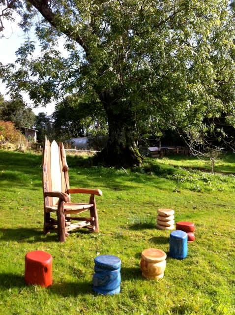Carved oak storytelling chairs with matching stools — handmade school seating, Wales