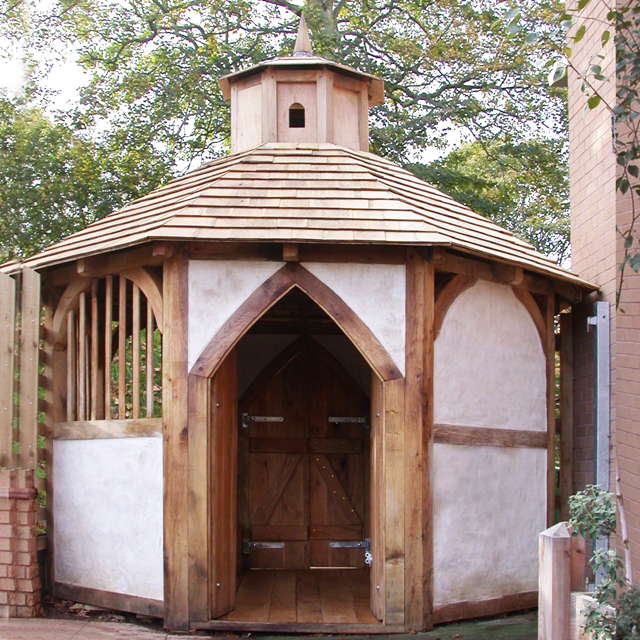 Handcrafted outdoor storytelling pavilion — timber frame storytelling house for schools and communities, Wales