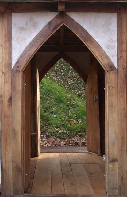 Door of handmade timber frame storytelling house — bespoke outdoor pavilion for schools, Wales