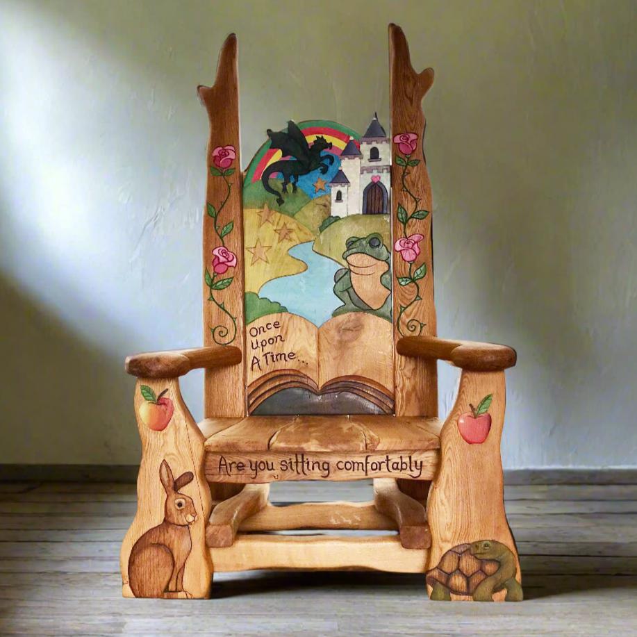 Handcrafted Fairytale Story Time Chair with vibrant castle, dragon, and woodland creature carvings, designed by school pupils and made from solid oak