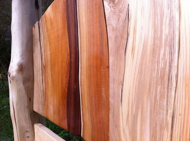 Solid oak stripy driftwood bed frame — handcrafted colourful sustainable bedroom furniture, Wales