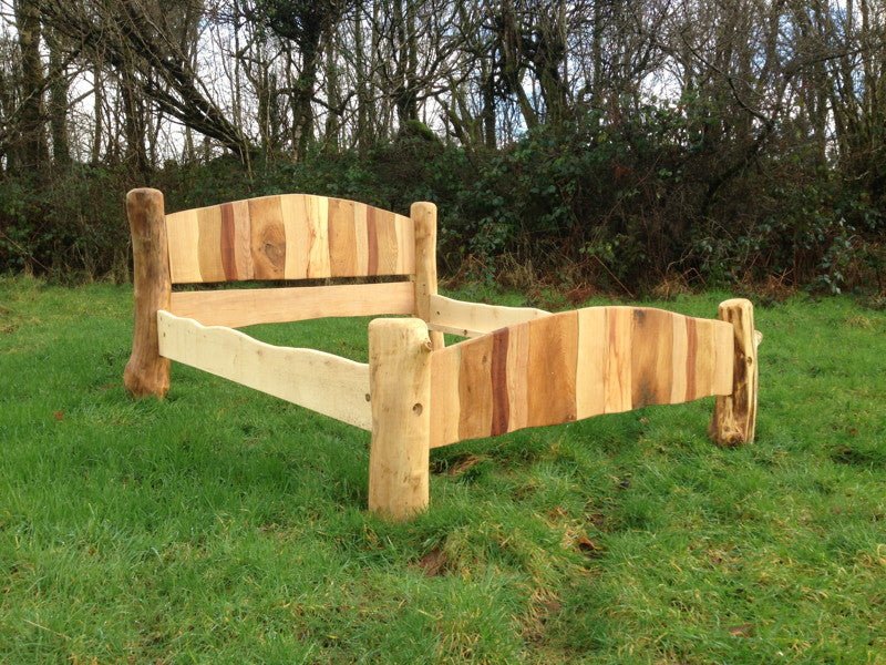 Stripy handmade wooden driftwood bed — colourful sustainable bedroom furniture, Wales