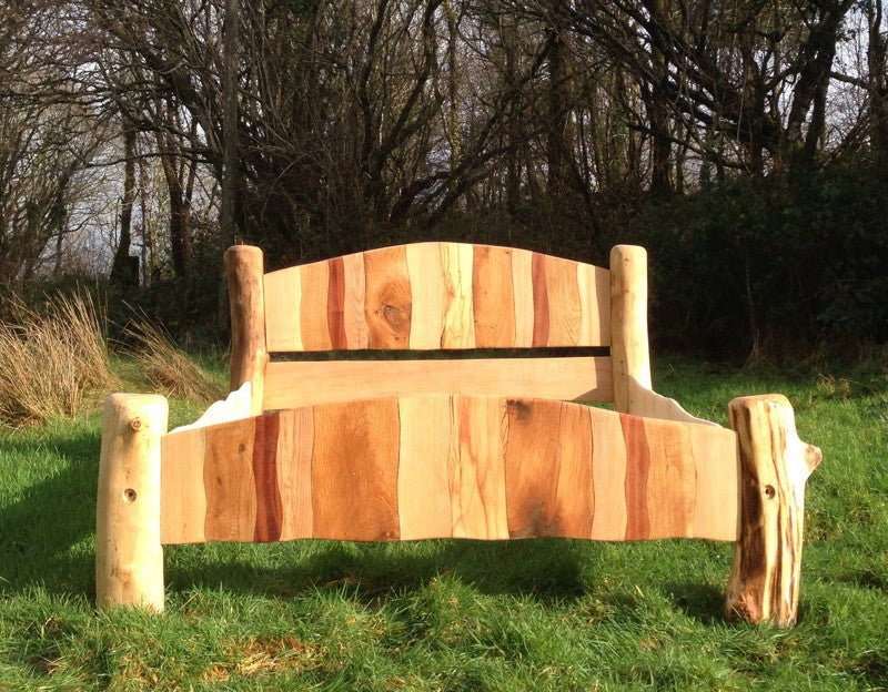 Handmade stripy driftwood bed frame — colourful sustainable wood bedroom furniture, Wales