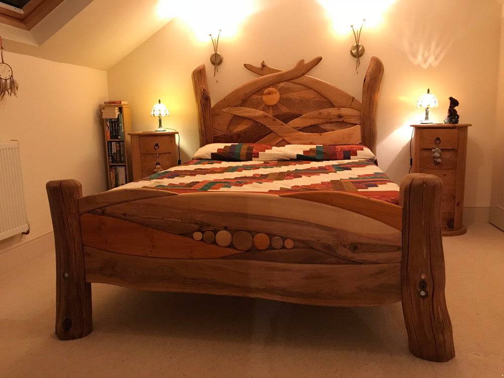 Solid oak Sunrise Bed with carved headboard — bespoke handmade wooden bed, Wales