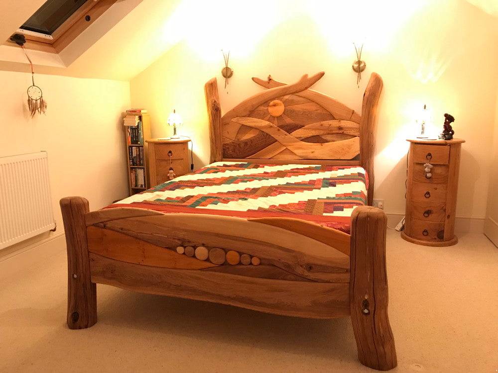 Custom-made solid oak Sunrise Bed — hand-carved bespoke wooden bed, handmade Wales
