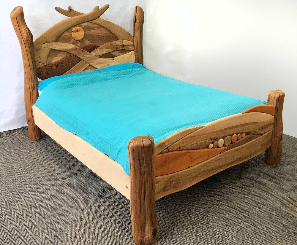 Handcrafted solid oak Sunrise Bed — bespoke carved wooden bed, handmade in Mid Wales