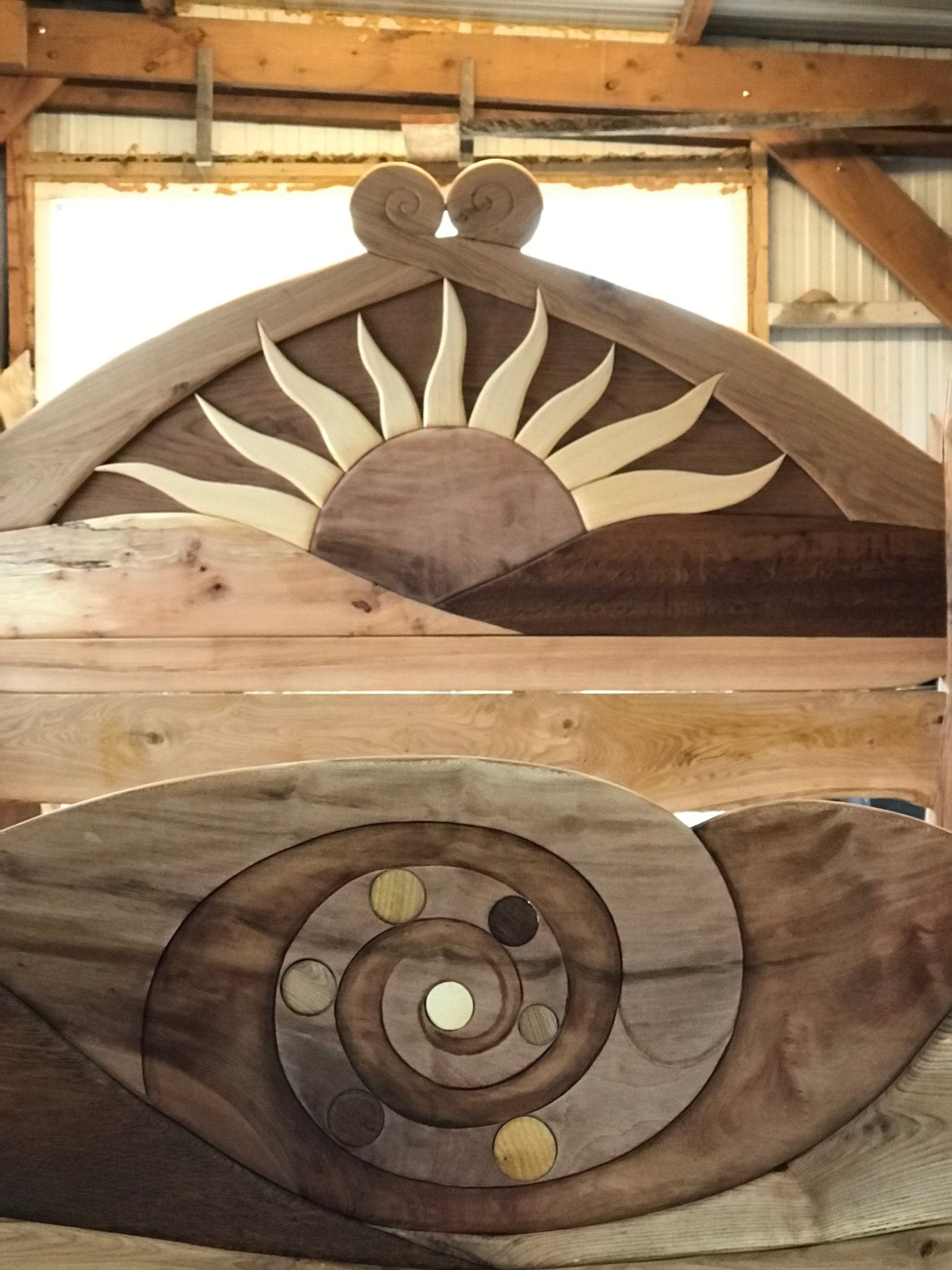 Hand-carved wooden sunshine bed — solid oak handmade bedroom furniture, Wales