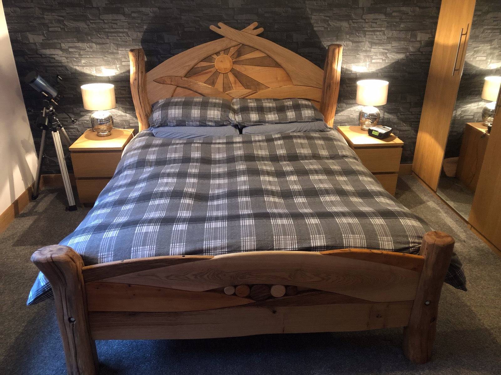 Bespoke bed with sunburst wood design