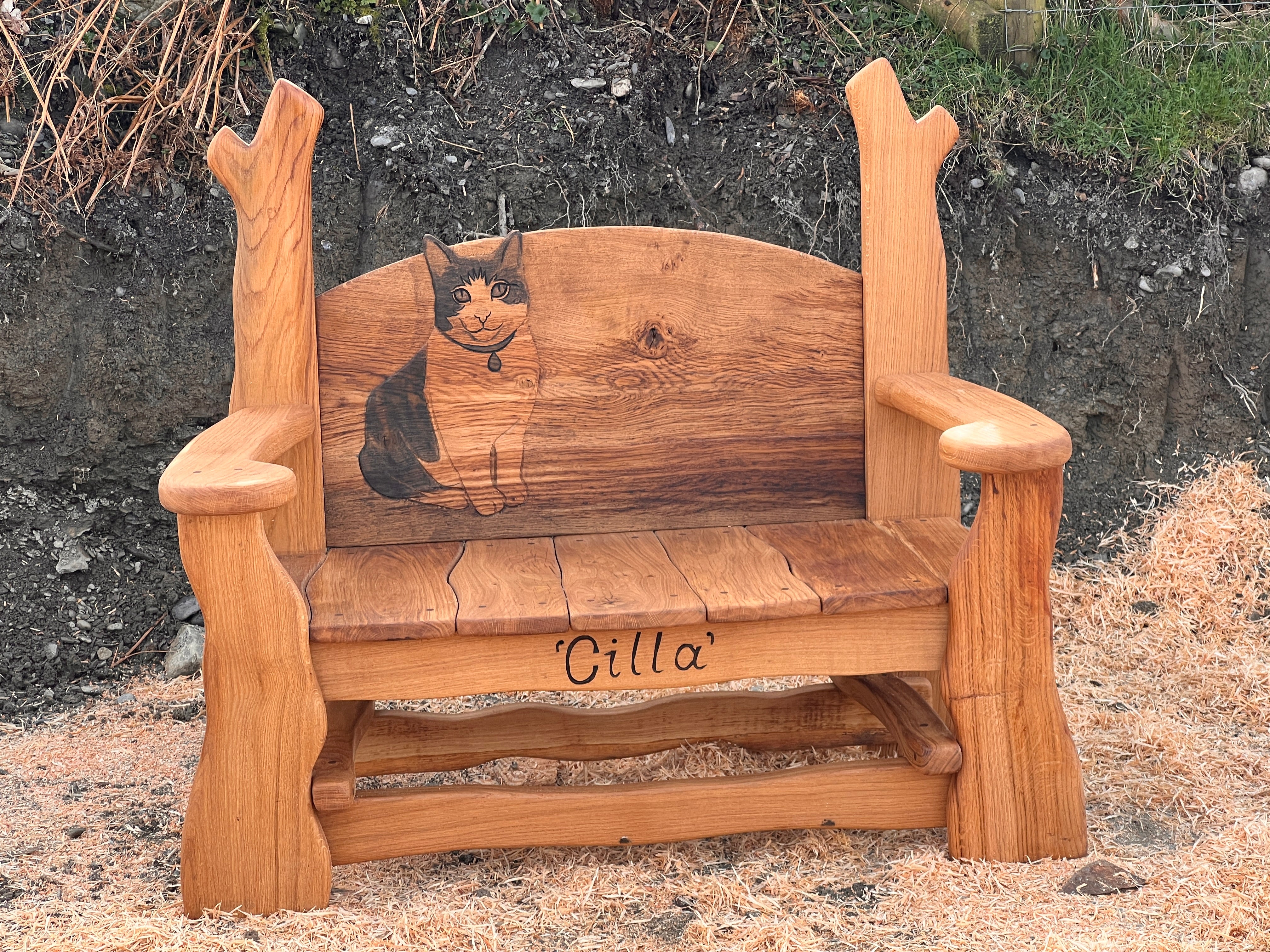 Bespoke oak tribute bench for schools or garden spaces
