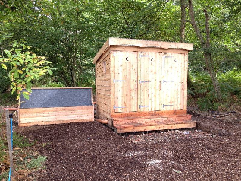 Waterless composting toilet block for festival use — eco timber construction, UK