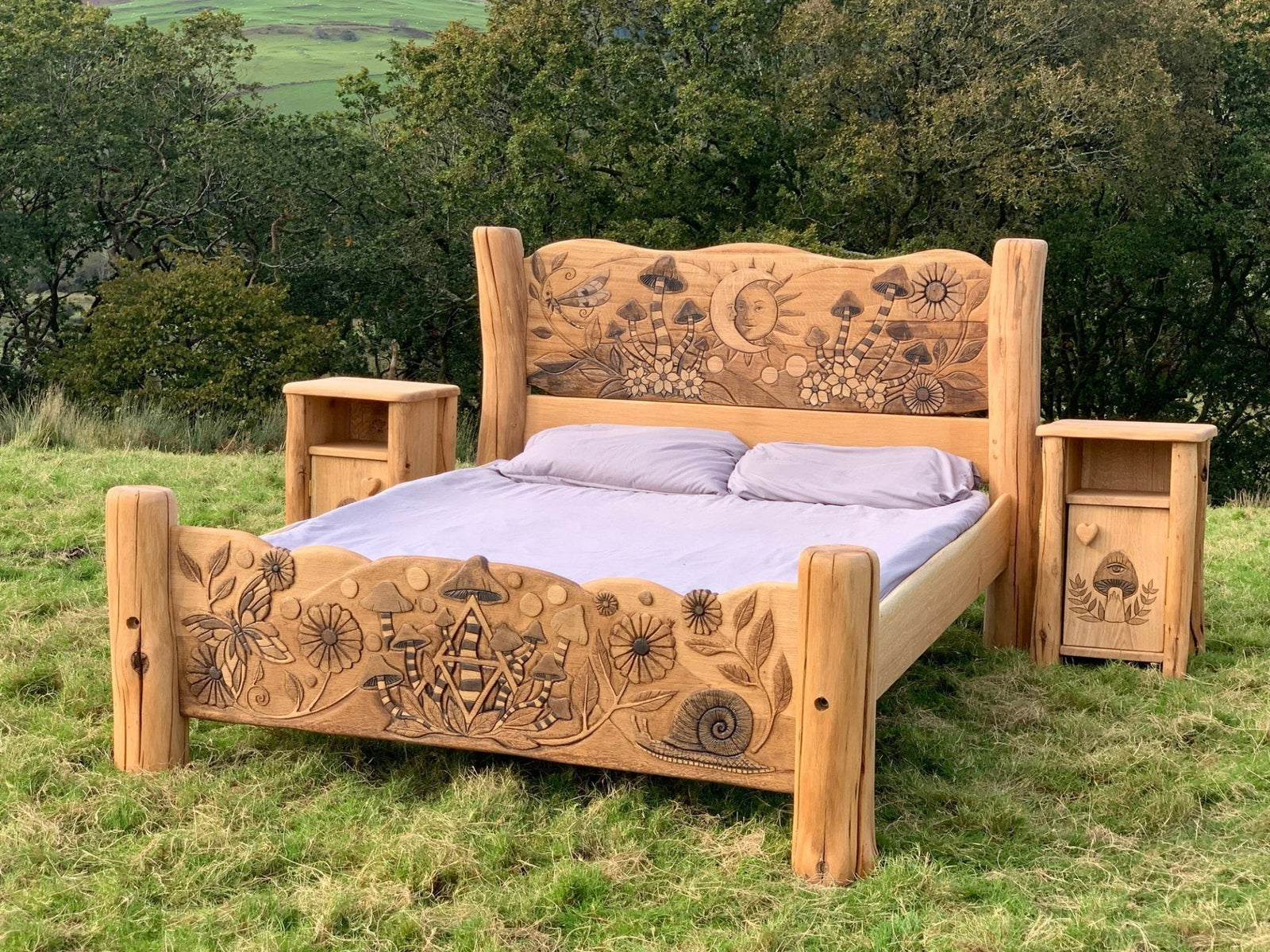 Solid oak fantasy bed with matching hand-carved bedside tables — bespoke, handmade Wales