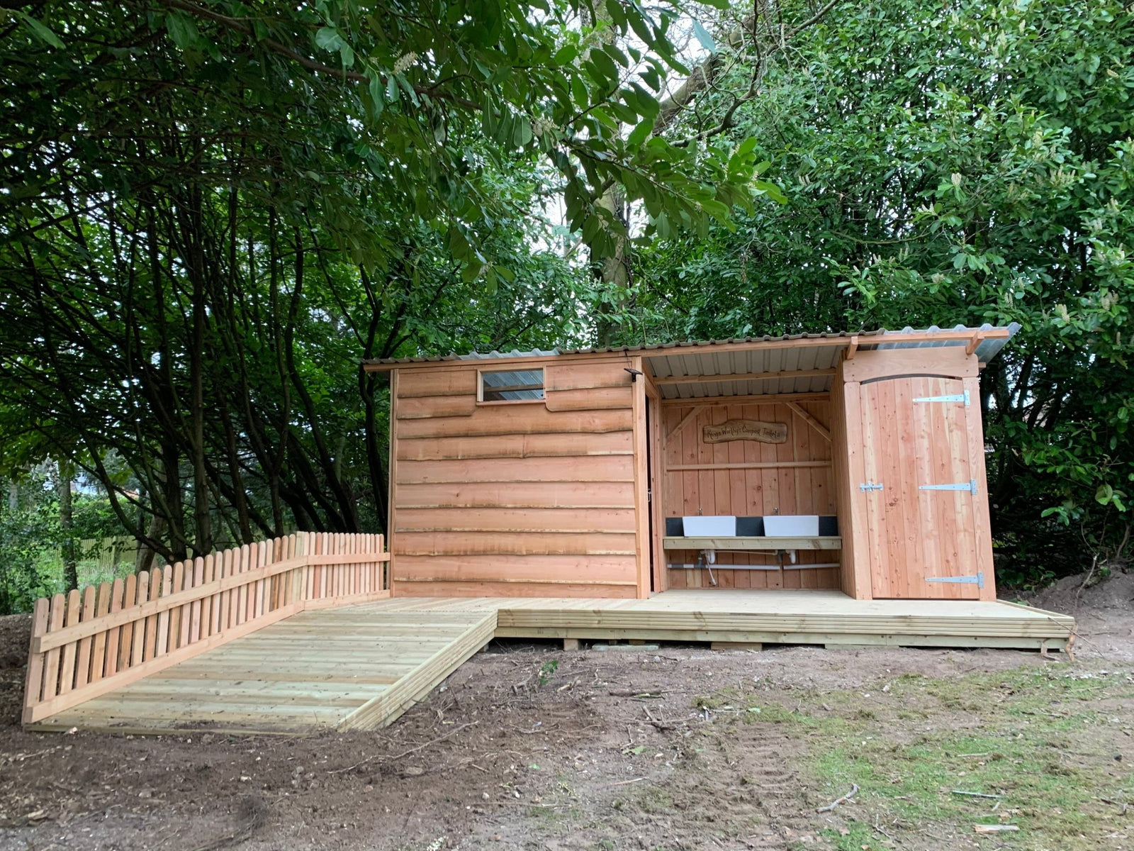 Twin composting toilet with wheelchair-friendly disabled access — handmade eco outdoor facility, Wales