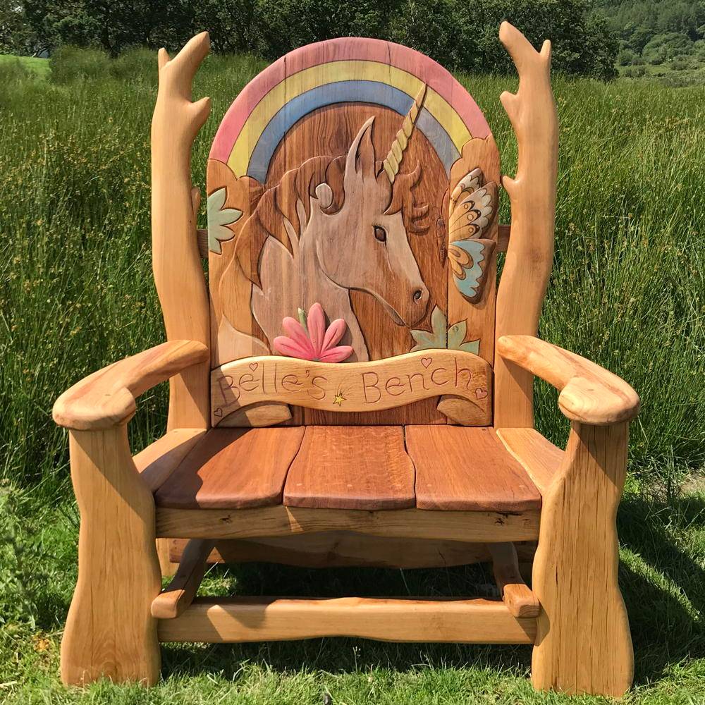 Handmade oak unicorn memorial bench — carved rainbow and unicorn tribute seat, Wales