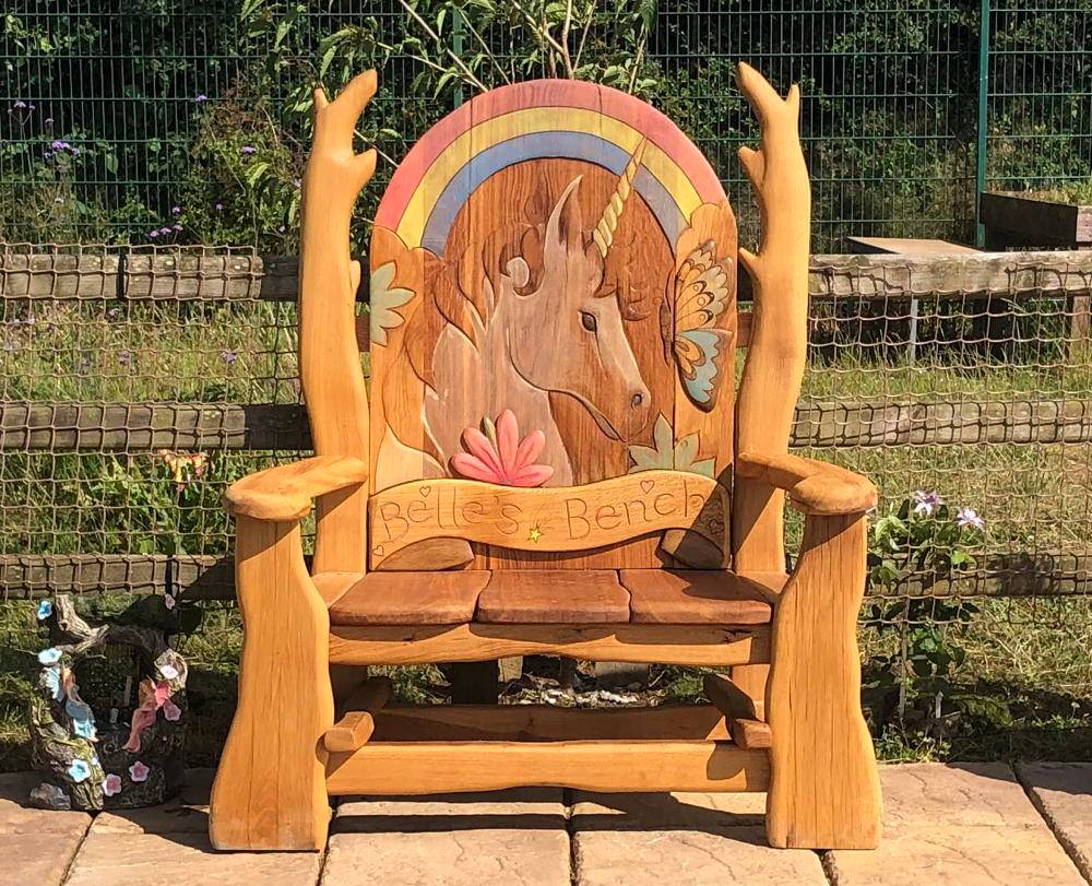 Handcrafted oak unicorn memorial bench for school garden — bespoke carved tribute seat, Wales