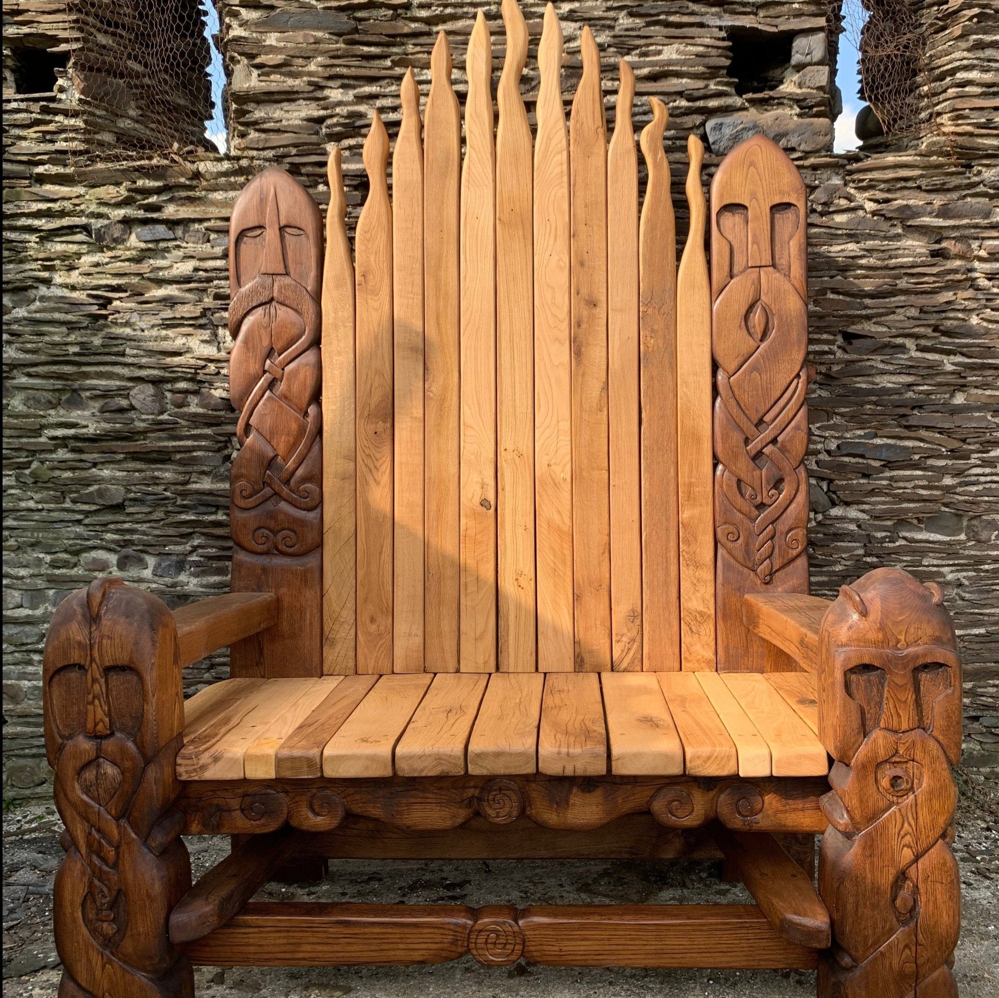 Handcrafted Viking Legend Bench Throne made from sustainable oak and chestnut, featuring intricate Norse carvings and an authentic Nordic design.

