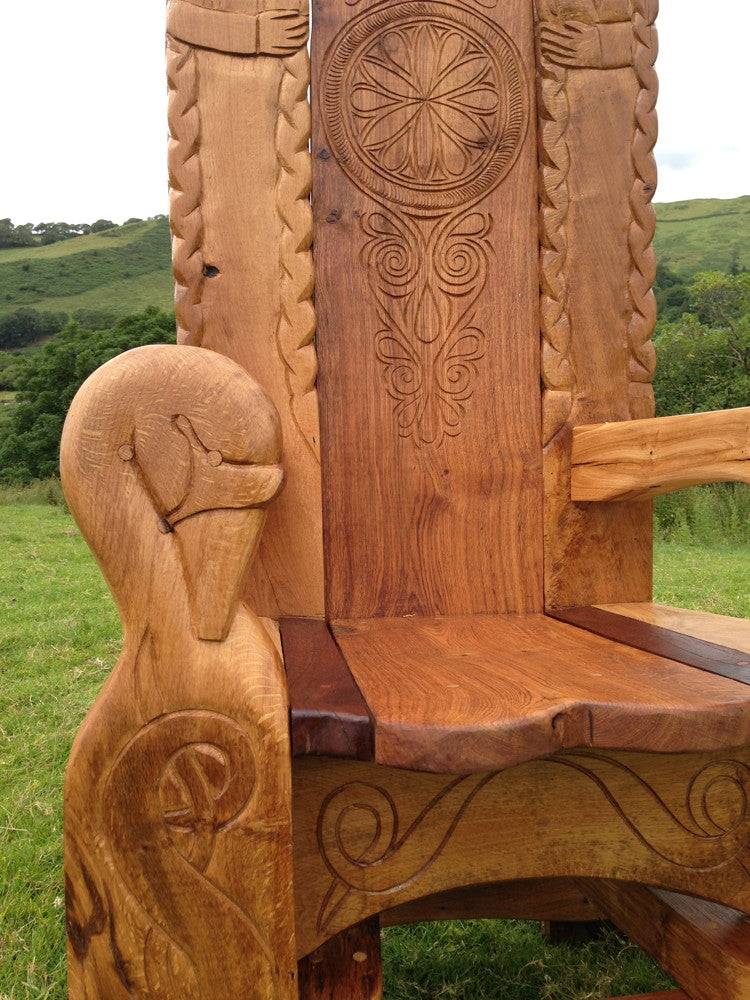 Hand-carved solid oak outdoor Viking Norse chair — bespoke handmade statement furniture, Wales