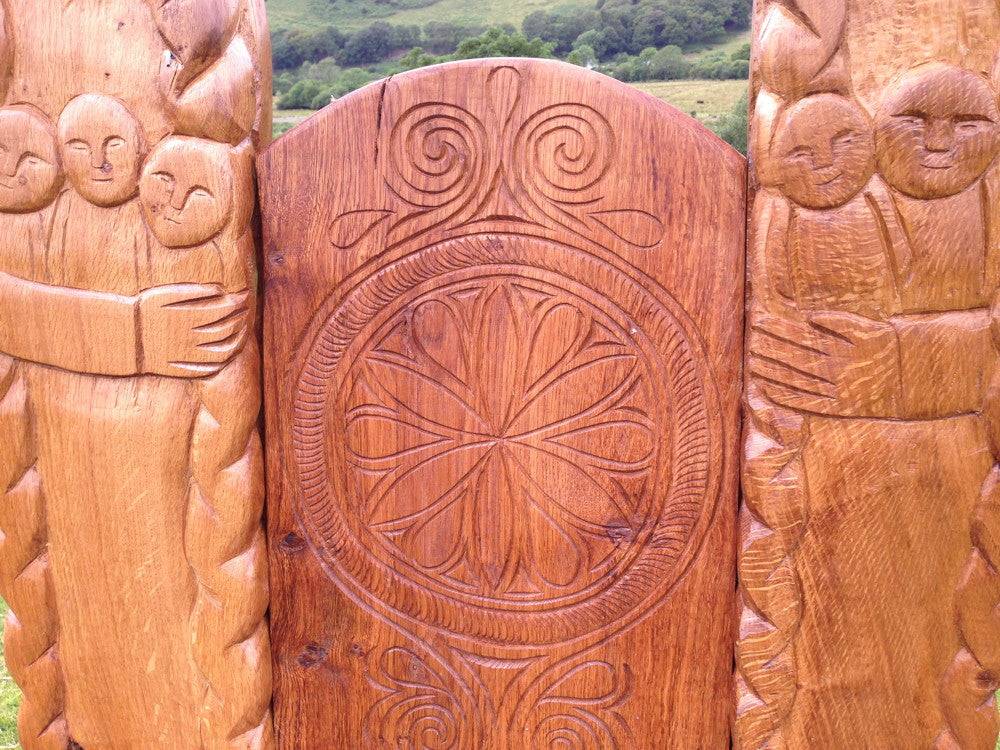Close-up of Viking carving on handmade oak Norse throne — bespoke furniture, Wales