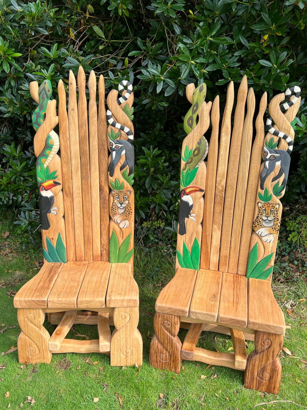 Handcrafted outdoor solid oak chair with jungle animal carvings — bespoke wildlife throne, Wales