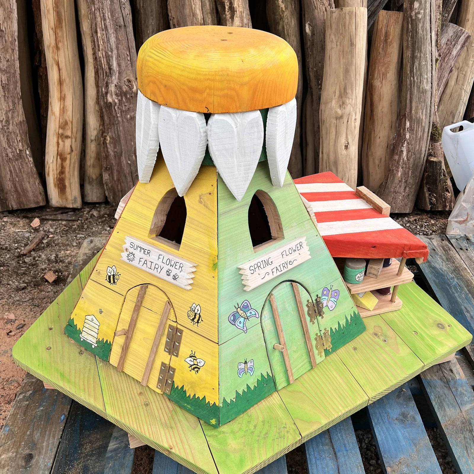 Handmade wildflower fairy house with hand-painted botanical details and autumn market stall, solid wood