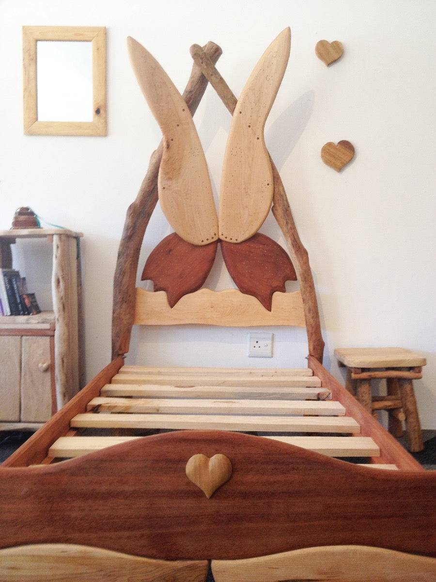 Handmade wooden fairytale princess bed with butterfly wing design — bespoke solid wood children's bed, Wales
