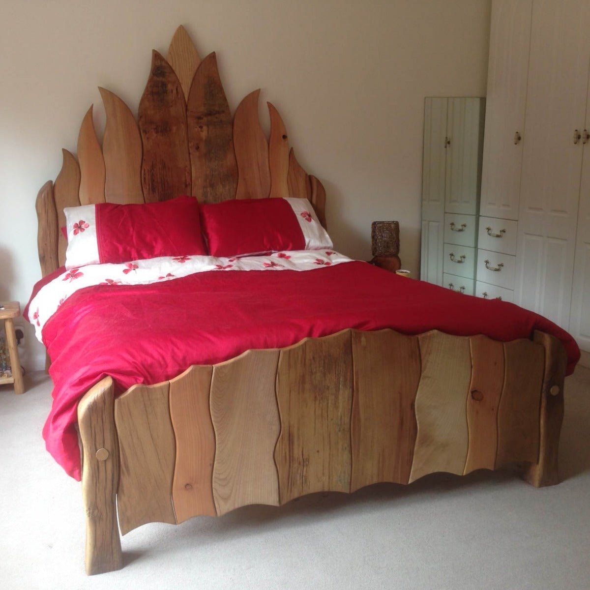 Handcrafted Viking Wooden Flame Bed with flame-inspired design made from locally sourced oak and ash — bespoke bedroom furniture, Wales