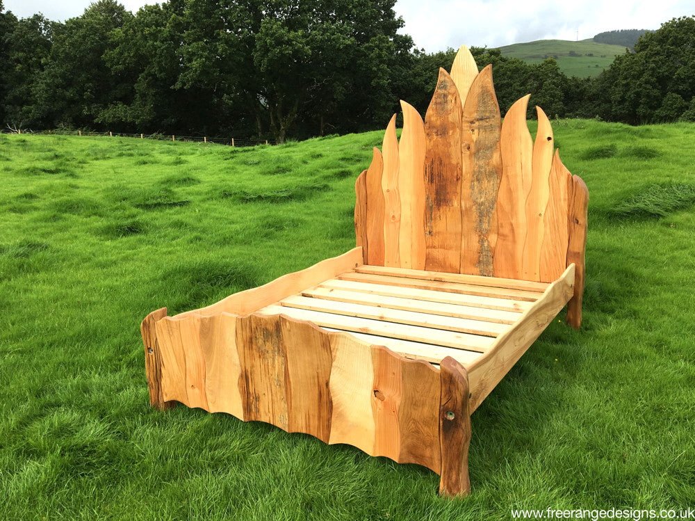 Handmade solid oak flame bed frame — Viking-inspired bedroom furniture, Wales