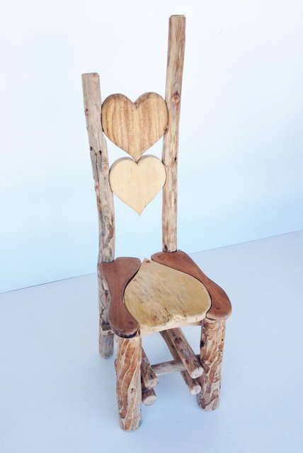 Close-up of driftwood grain on handcrafted kiddies chair — natural children's furniture, Wales