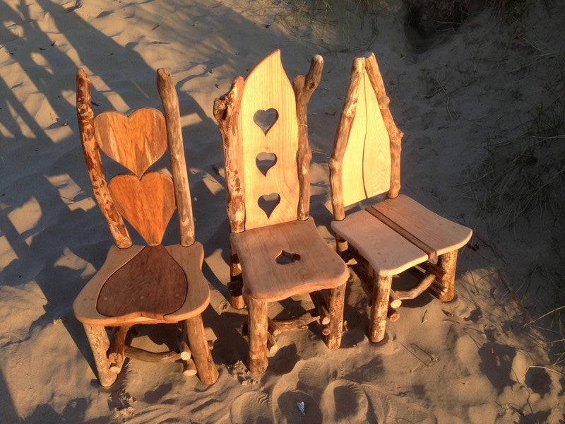 Handcrafted driftwood kiddies chairs with organic branch forms — natural children's furniture, made in Wales