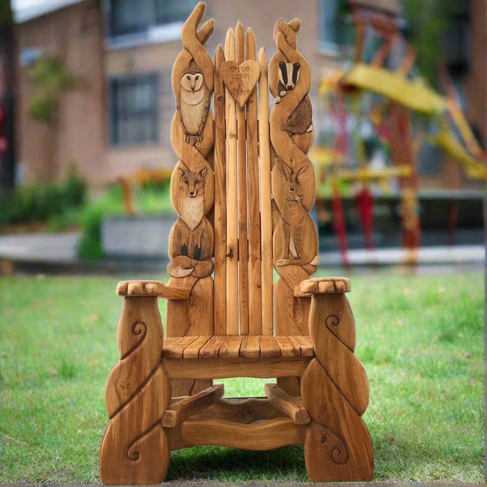 Handcrafted wooden throne with animal carvings