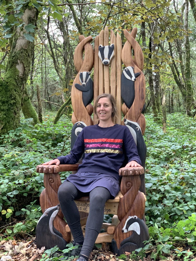 Person seated on Badger Storytelling Chair