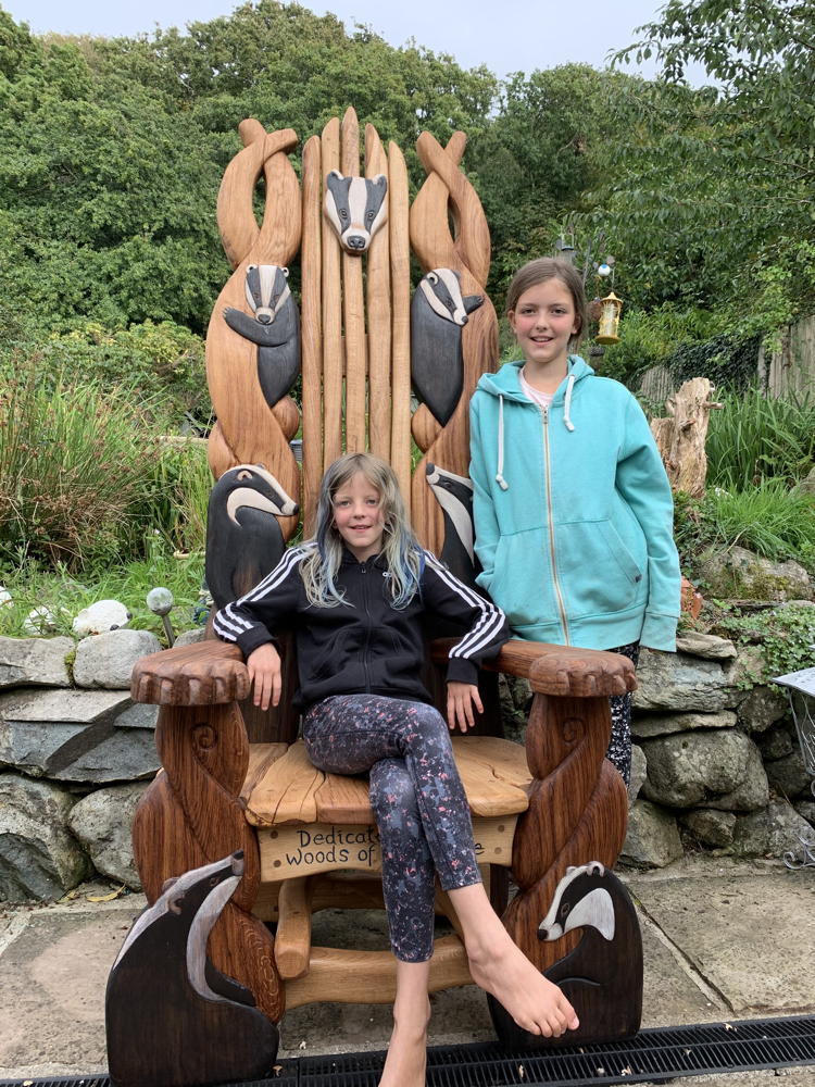 Children sitting on Badger Storytelling Chair