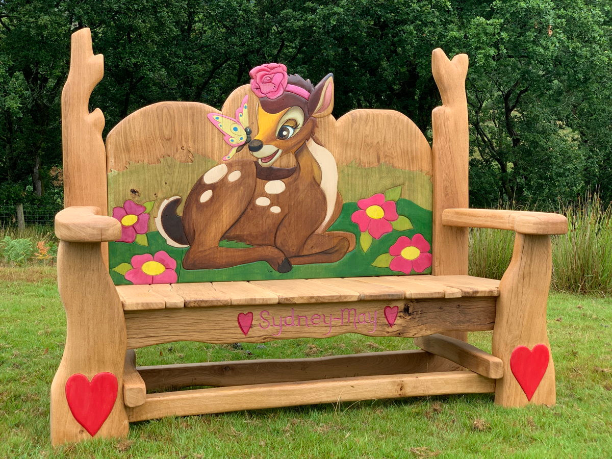 Memorial oak bench with Bambi and floral accents