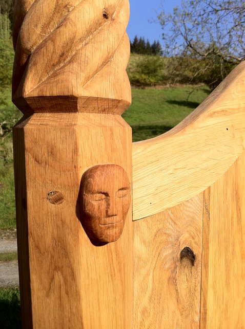 carved head on storytelling chair