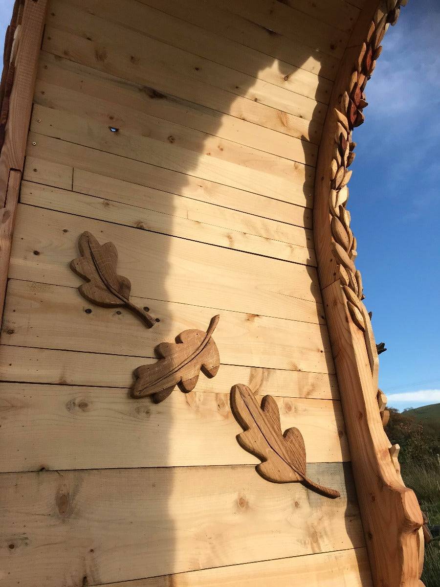 hand-carved wooden arch