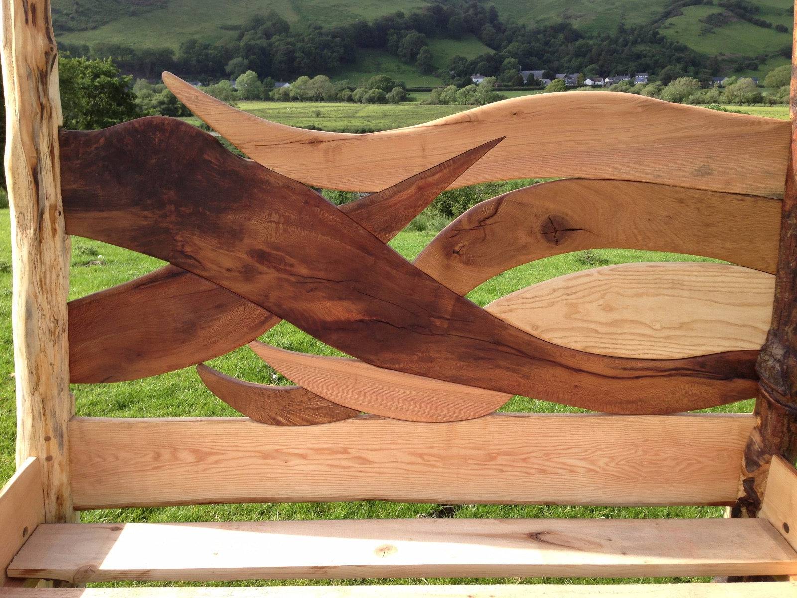 Close-up of spalted beech headboard on driftwood bed