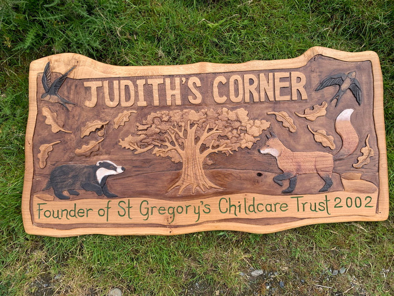 Relief wood sign outdoors