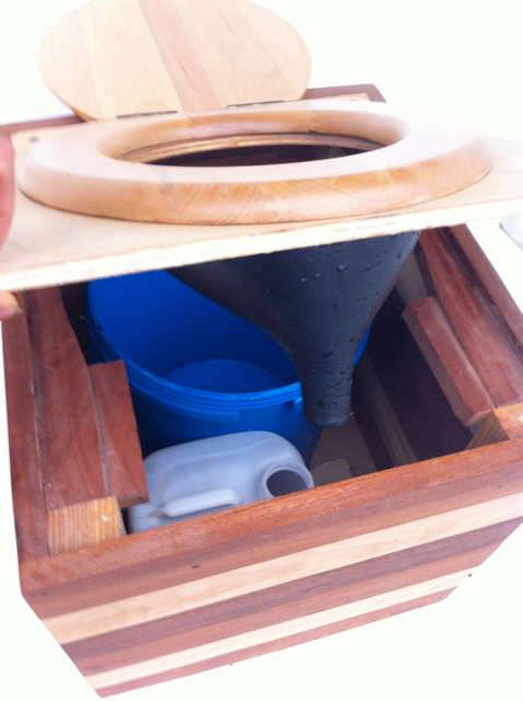 Inside view of composting toilet with urine diverter