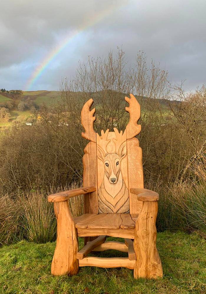 Stag Storytelling Chair under rainbow