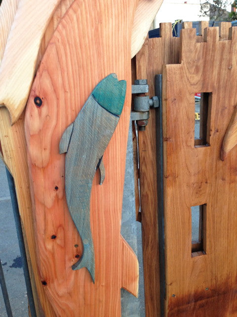 wooden fish on arch