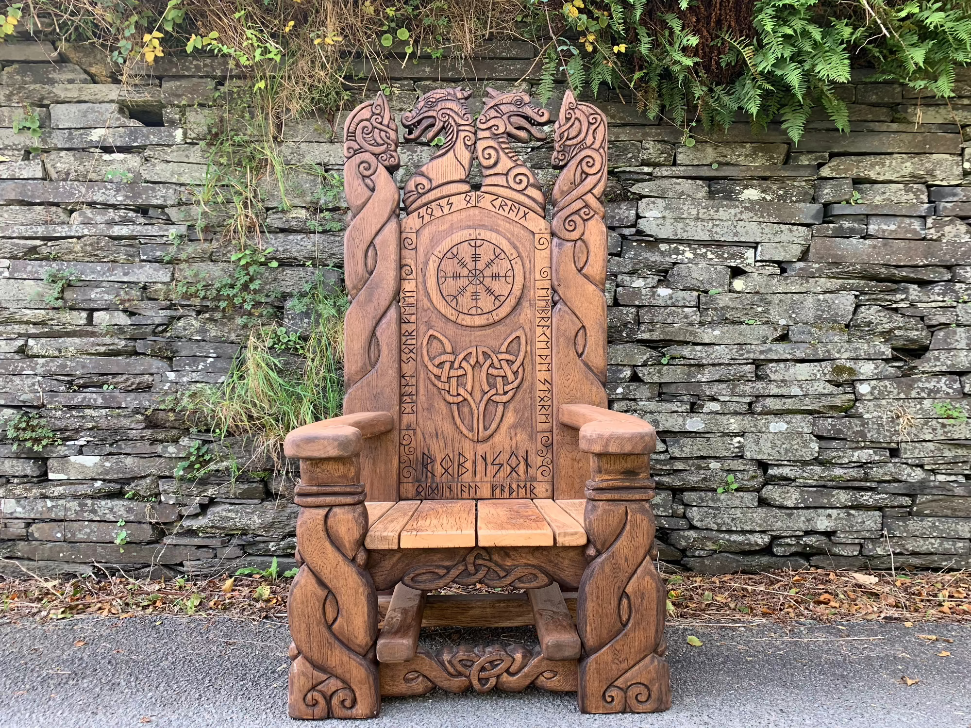 Handcrafted Viking throne with Celtic knotwork by Free Range Designs, made from wood with intricate carvings